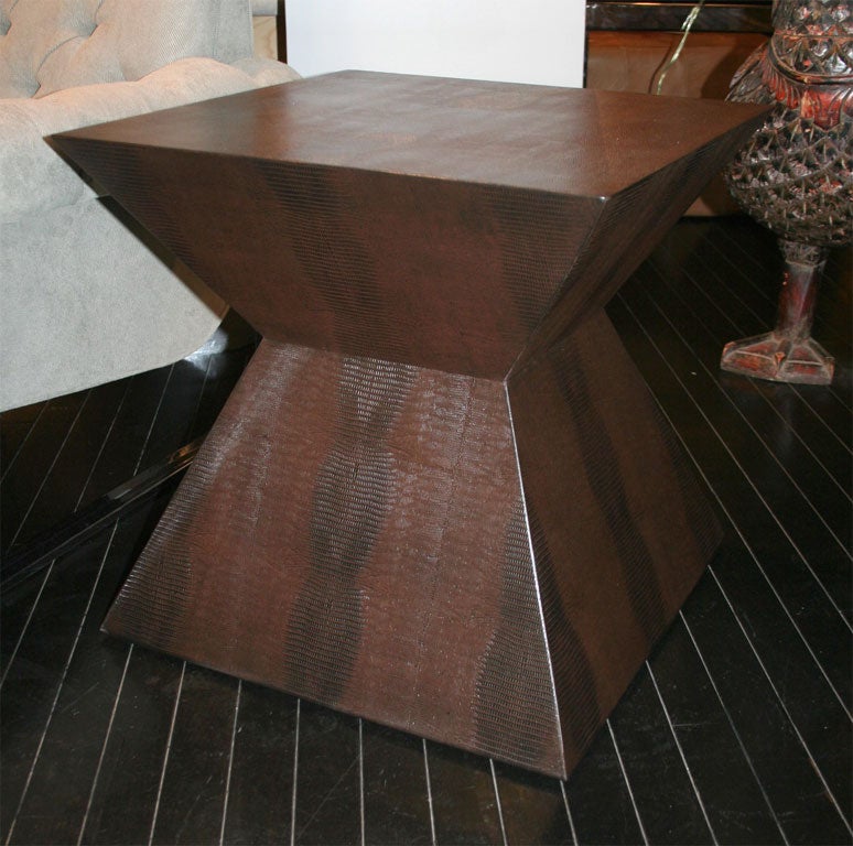 Sculptural side table covered in chocolate embossed reptile leather by Karl Springer, American 1980's