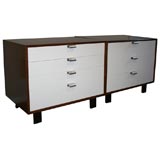 Pair of walnut George Nelson chests with white lacquered fronts