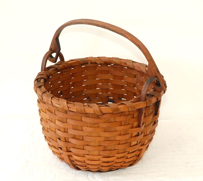 NEW ENGLAND SWING HANDLE BASKET WITH A WOOD BOTTOM