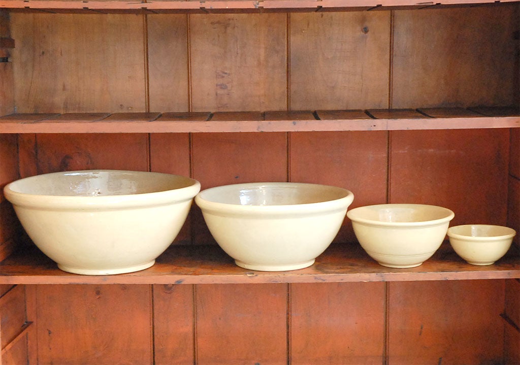 SET OF FOUR 19THC YELLOW WARE BOWLS