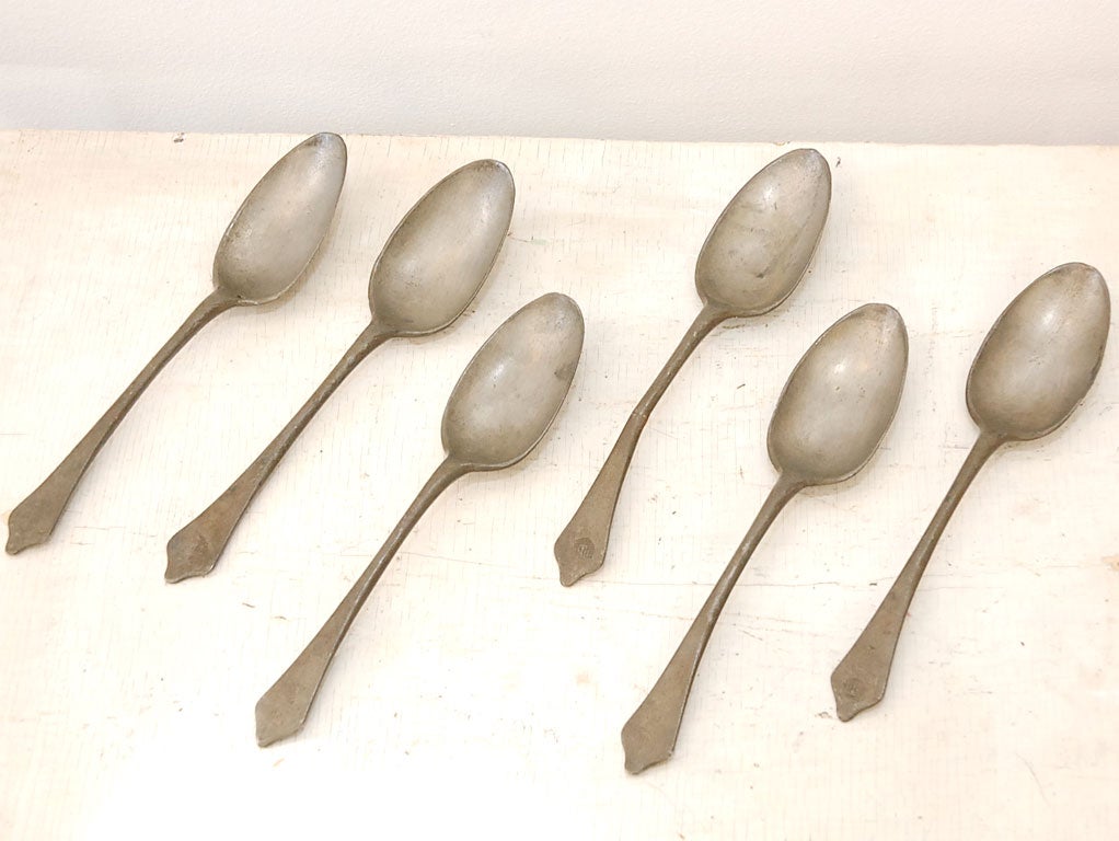 SET OF EARLY 19THC PEWTER SPOONS WITH HALLMARKS  EMBOSSED ON END OF HANDLE.SET IN WONDERFUL CONDITION .GREAT ADDITION TO ANY COUNTRY COLLECTION.SOLD ONLY AS A SET.
