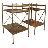 Pair of three tier side tables by Bagues