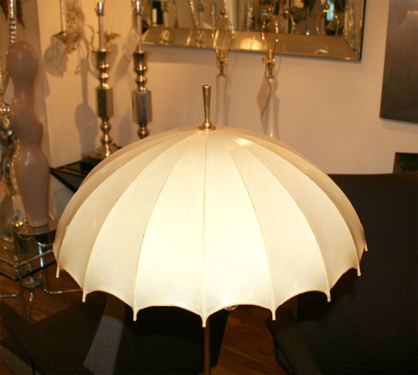 Single brass umbrella form floor lamp with vellum shade 4
