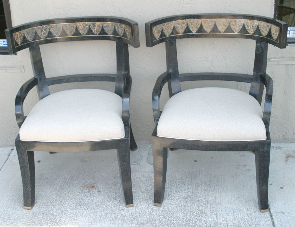 Dramatic pair of klismos armchairs. Impressive from every angle.