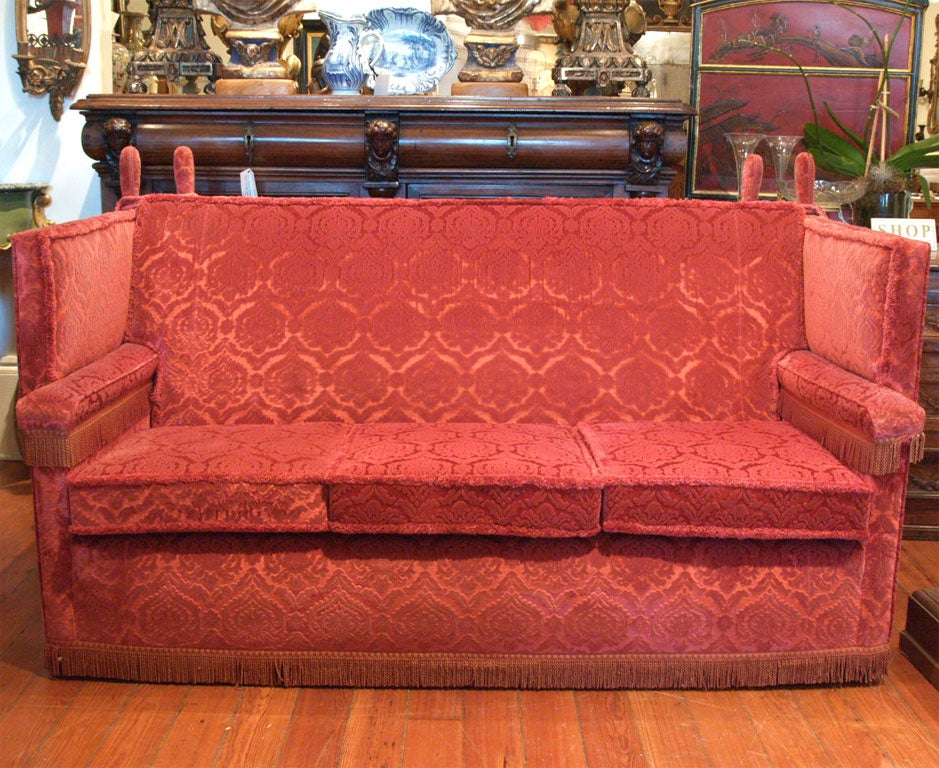 Exceptional Silk stamped velvet knole sofa with original upholstry and fringe and ties.