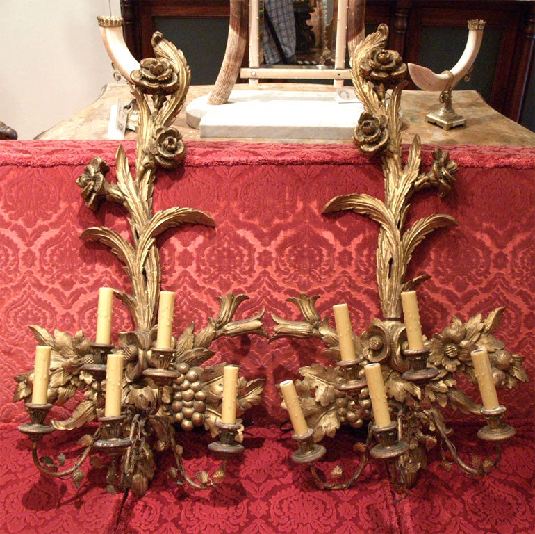 These are probably from the late 19th c to as late as the 20's but are FAB carving and guilding. They are 5 arms each and are rewired and ready to go.