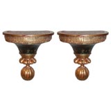 Pair of Parcel Gilt and Ebonized Demilune Wall Brackets