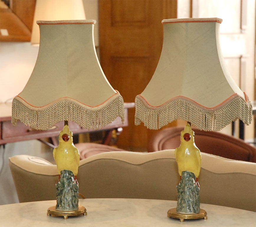 Pair of retro-chic ceramic parrot lamps.