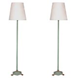 Pair of adjustable bronze floor lamps in the style of Rateau