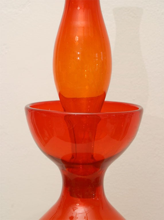 Delicious Tangerine glass decanter with curves, curves, curves! Designed by Wayne Husted, circa 1956. 