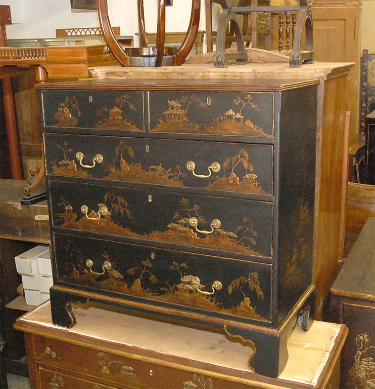 19th Century George III chest of drawers with new 18th century William & Mary style Chinoiserie painting and guilding. Lamp black surface color with elaborate raised gessoed figures and scenes finished with gold and silver gilt. Three drawers below