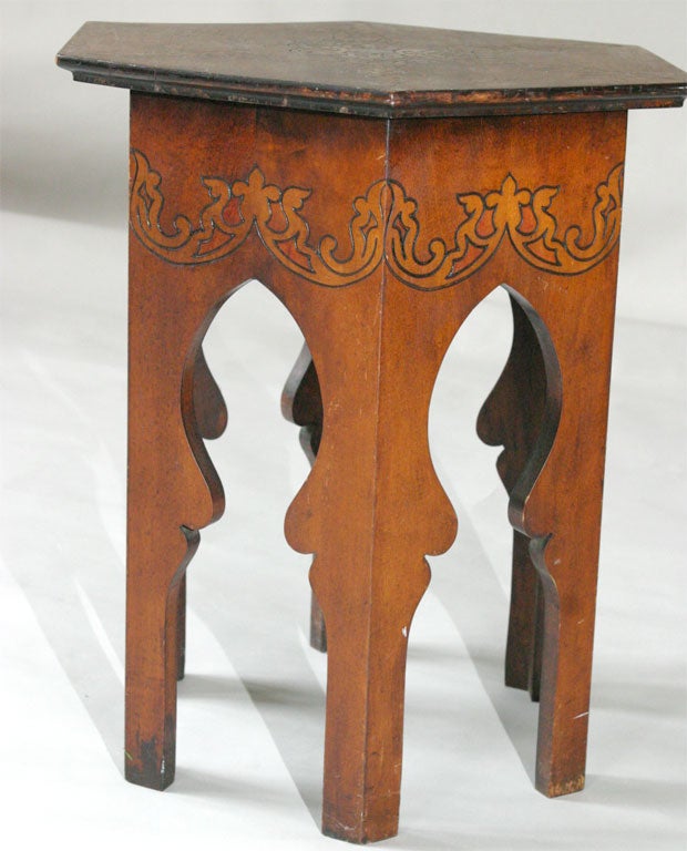 Moroccan style taboret with pyrography decoration.  Six-legged Gothic base.
