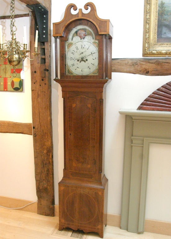 Mahogany veneered tall case clock , with moon & sun enamel dial, probably Albany N.Y. area.All original.