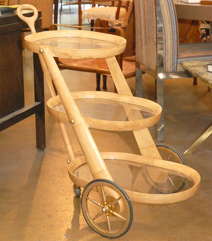 Aldo Tura 3 tiers tea cart in goat skin parchment.