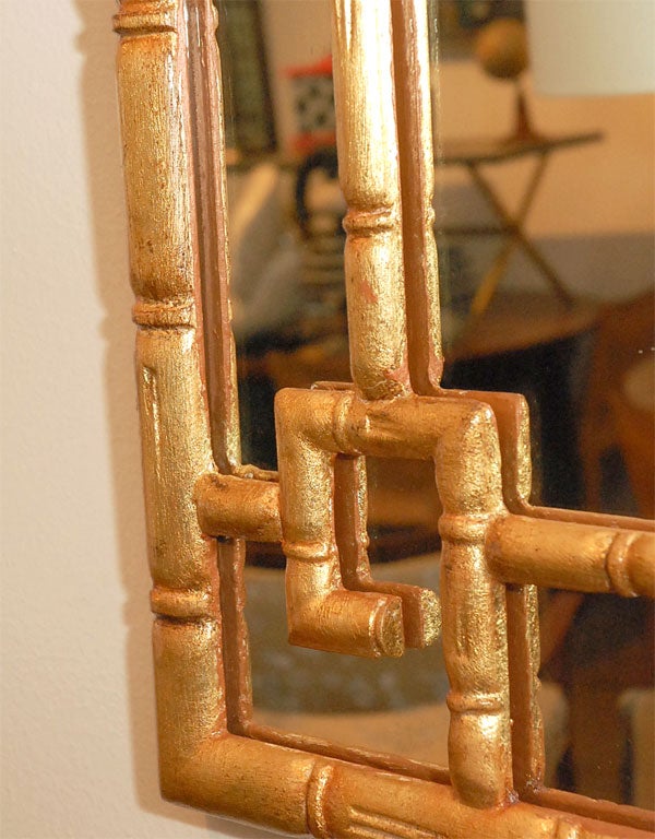Wood Faux bamboo gilt gold leaf mirror.