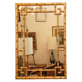 Faux bamboo gilt gold leaf mirror.