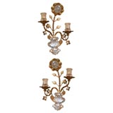A pair of Bagues two-light gilt iron wall sconces