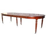 A French mahogany dining table