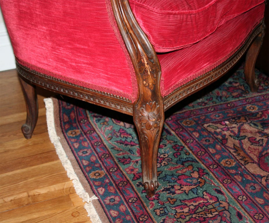 A French Louis XVI style hand carved porters chair with cabriole legs.  Circa 1880