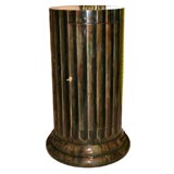 A Lacquered Parchment Trompe l
Oeil Bar.