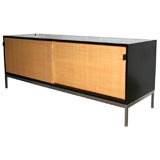 Early Florence Knoll rattan and black laminate credenza