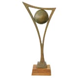 A Patinated Bronze Geometric Sculpture on Walnut Plinth