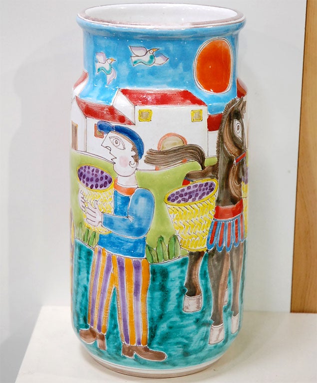 Italian Desimone vase. Many people collect these pieces, but this one has the Desimone signature on the front of the piece, and that means it was done by him. After he died they kept the company going for awhile, but the pieces were painted by hired