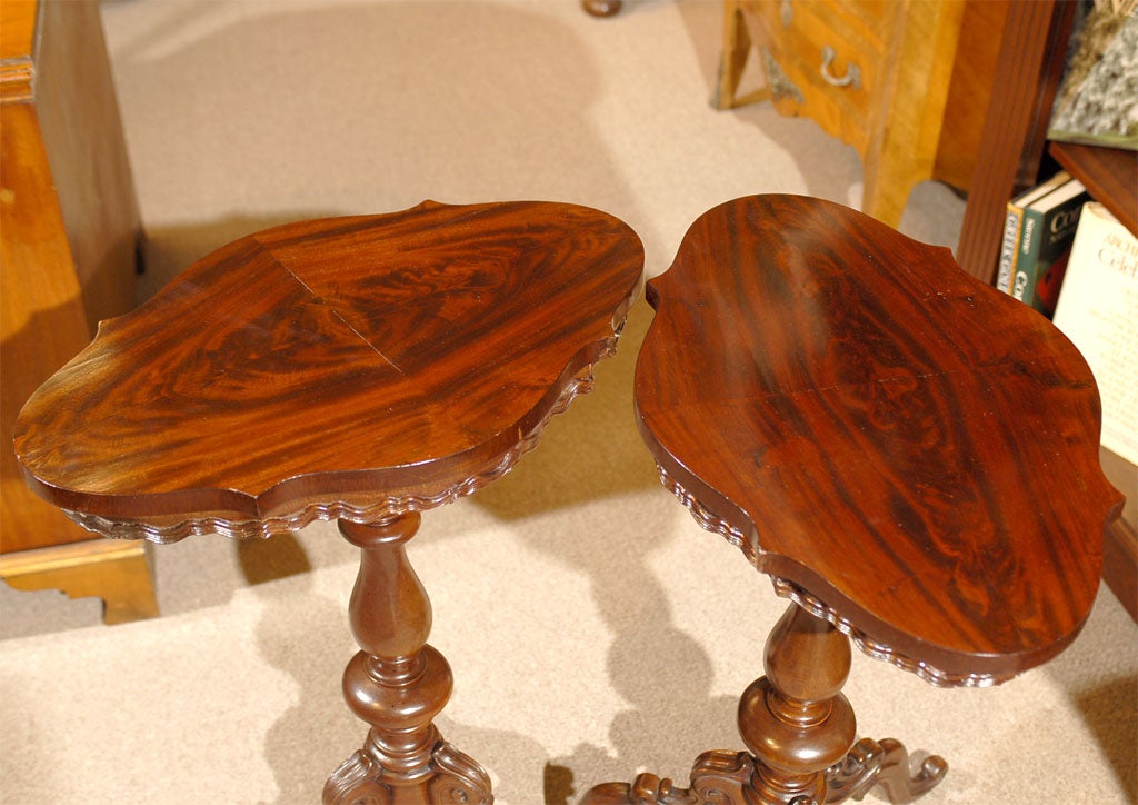 Pair of Scalloped Edged Tripod Tables.