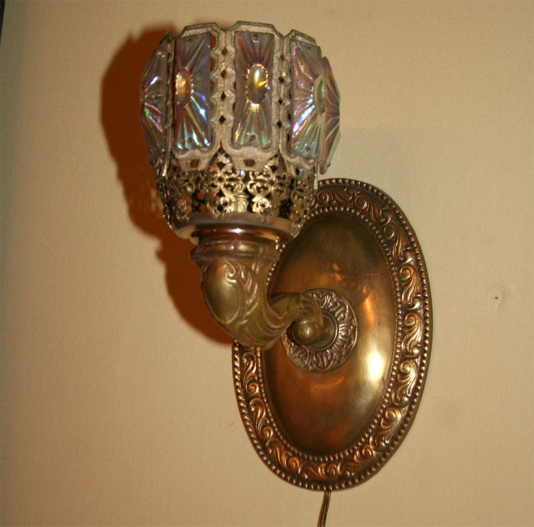 Pair of Bronze and Iridescent Glass Sconces