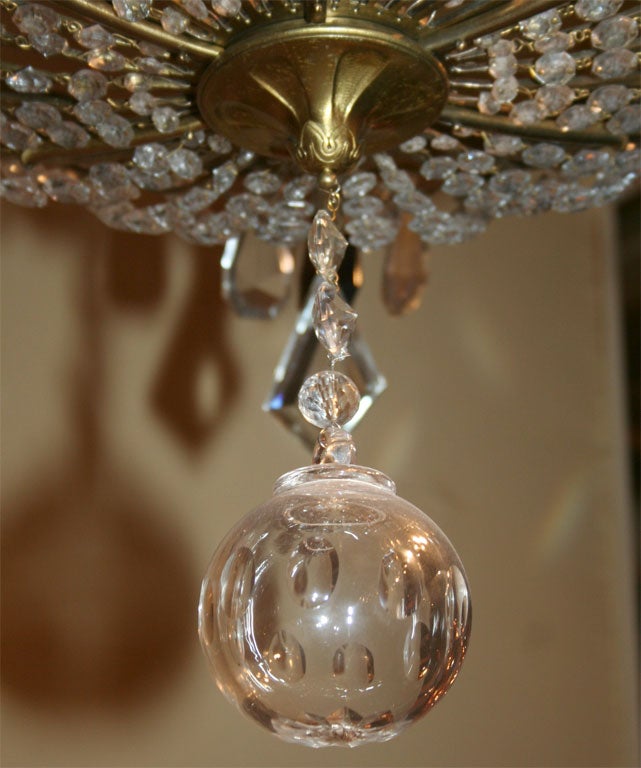 Mid-20th Century French Art Deco Bronze and Crystal Ten-Light Chandelier For Sale