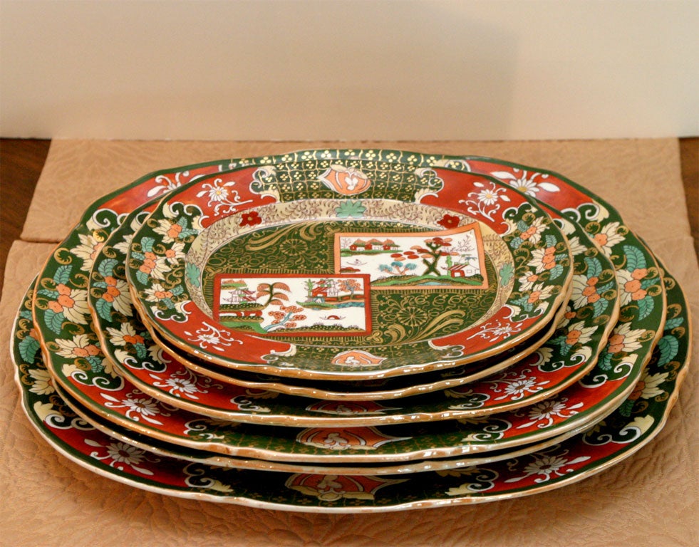 An extensive and creatively decorated, hand painted Ironstone dinner service with 