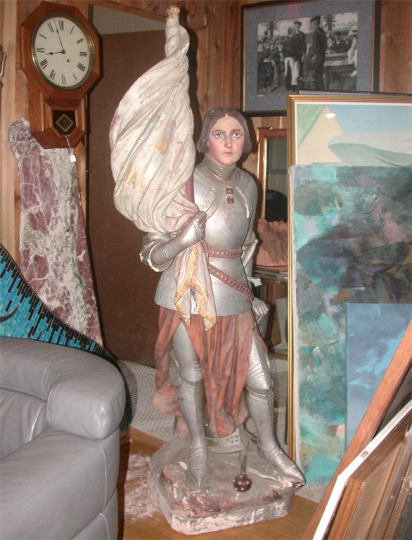 Lifelike Joan of Arc polychromed wood and chalk lifesize statue with glass eyes.