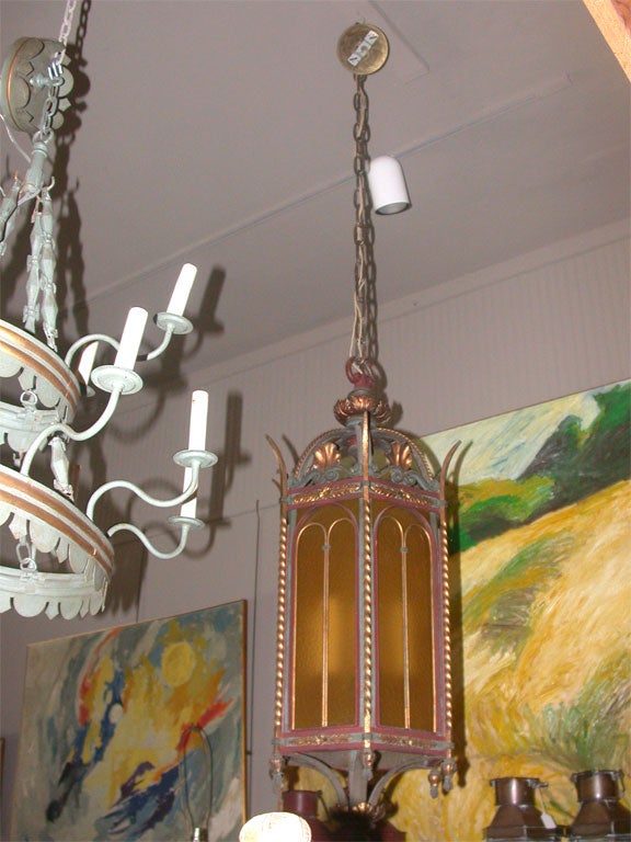 Renaissance revival gilt bronze lantern chandelier-gilded and cold painted bronze with original amber slag glass and original ceiling cap.