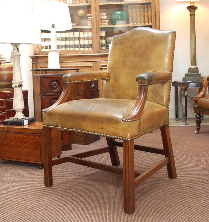 A GAINSBOROUGH CHAIR IN LEATHER