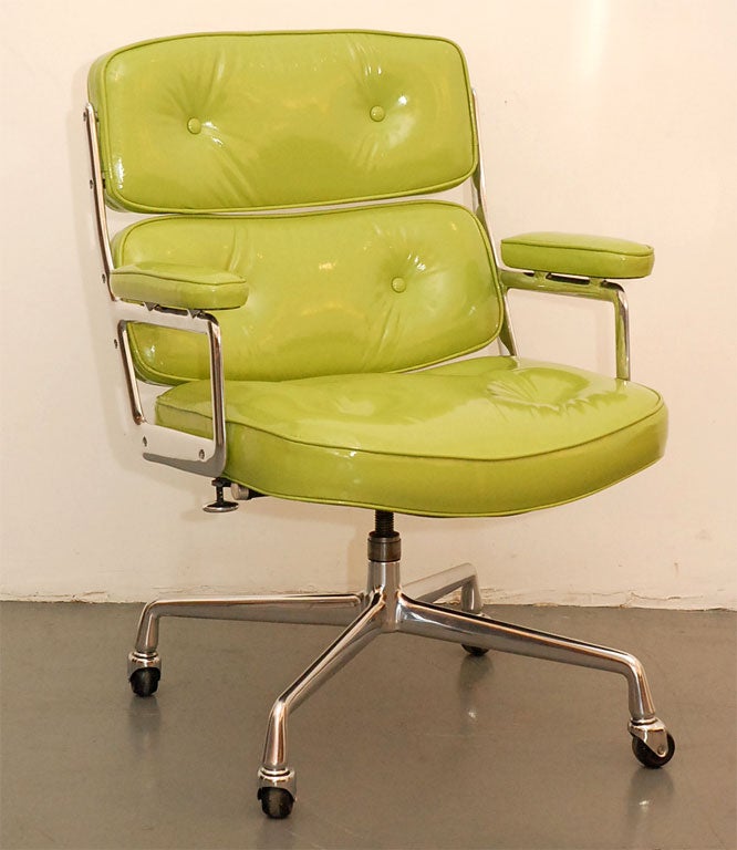 Classic office chair, from the Time Life building in New York. Designed by Eames. Newly upholstered in lime green patent leather with perfectly polished aluminum base. Multiple quantity available and may be reupholstered in any leather.
