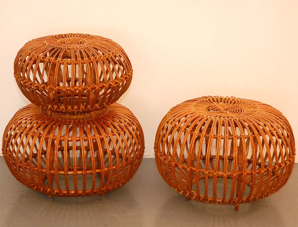Franco Albini rattan ottoman.  Multiple sizes available.  All in excellent condition.  Smaller Ottomans are priced at $495