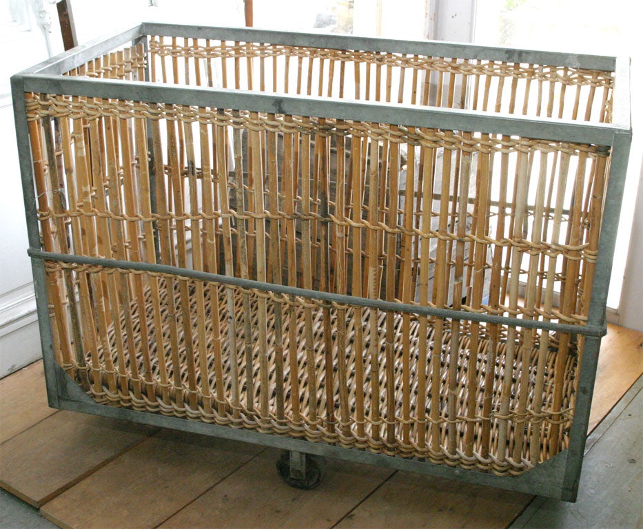 Unusual Bamboo with metal frame laundry cart on wheels.  Can be used for variety of purposes.