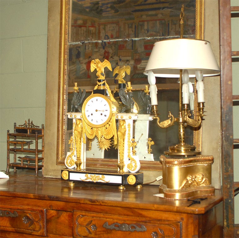 A Louis XVI Marble, Ormolu and Patinated Bronze Mantle Clock