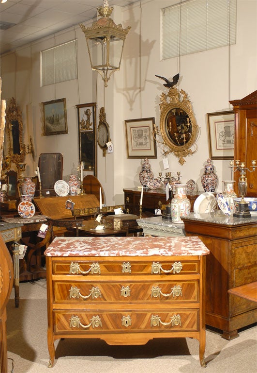 A Louis XVI (Possibly Transitional LXV/LXVI) commode, French in origin and dating from the 1780s. The marble top a beautiful blend known as 