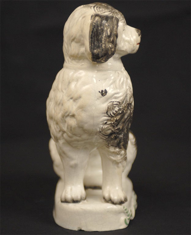 Rare Black and white Pipe Smoking dog on base, English c 1850