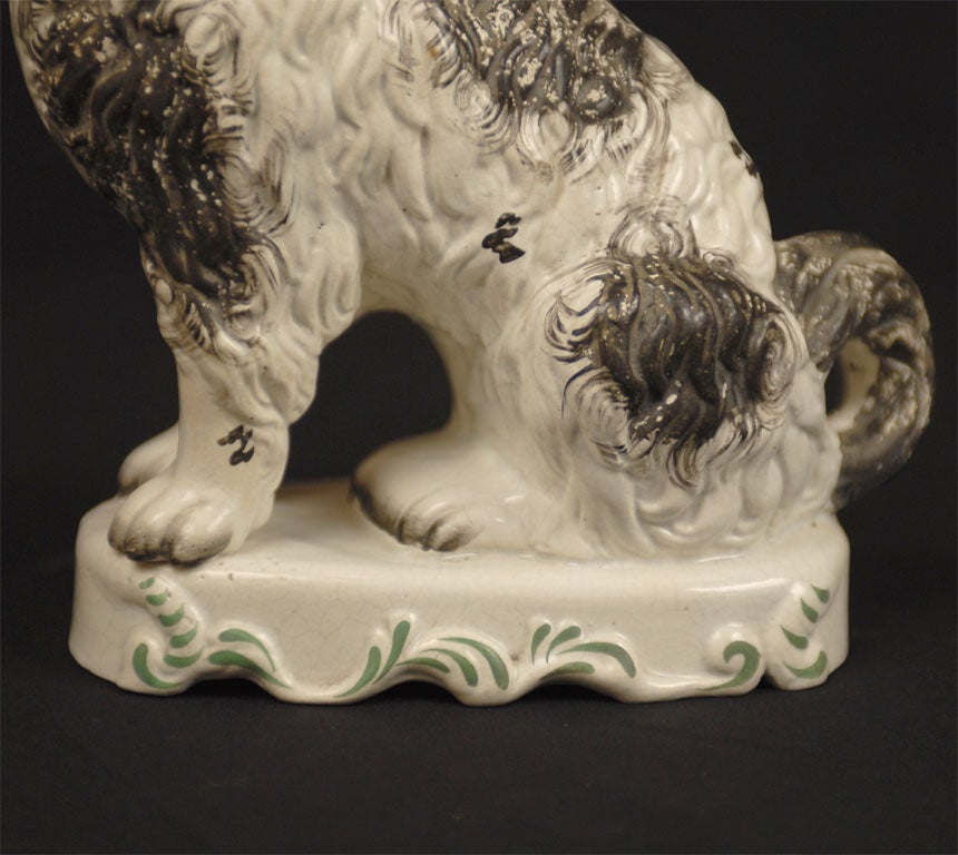 19th Century Staffordshire Pipe Smoking Dog on Base, black and white