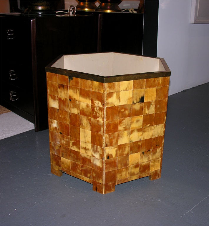 A tessellated tortoiseshell jardinière with grey lacquered interior and substantial brass top edge band. By the Rudolph Collection. U.S.A., circa 1970.