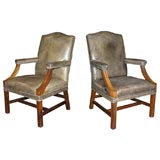 Pair of 20th C Mahogany and leather open arm library chairs