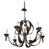 20th Century patinated iron six light chandelier