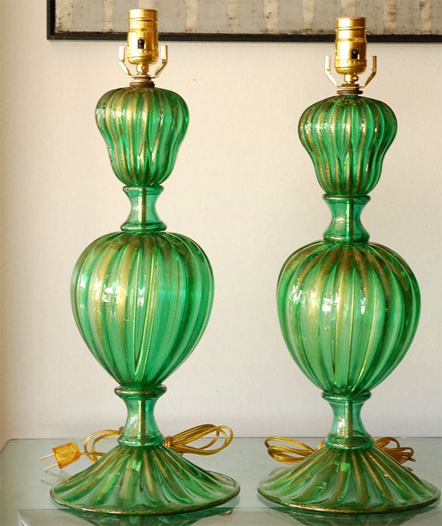 Pair of emerald green  and gold dust glass murano table lamps.