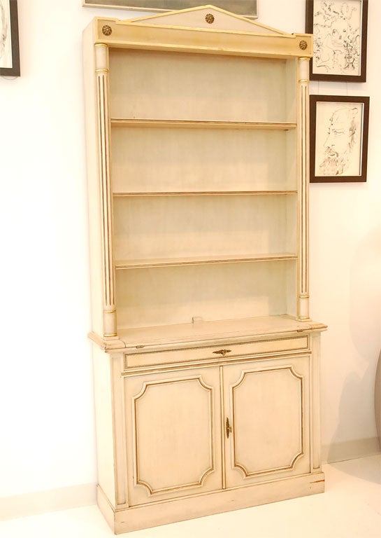 Handsome two-piece bookcase, stamped 