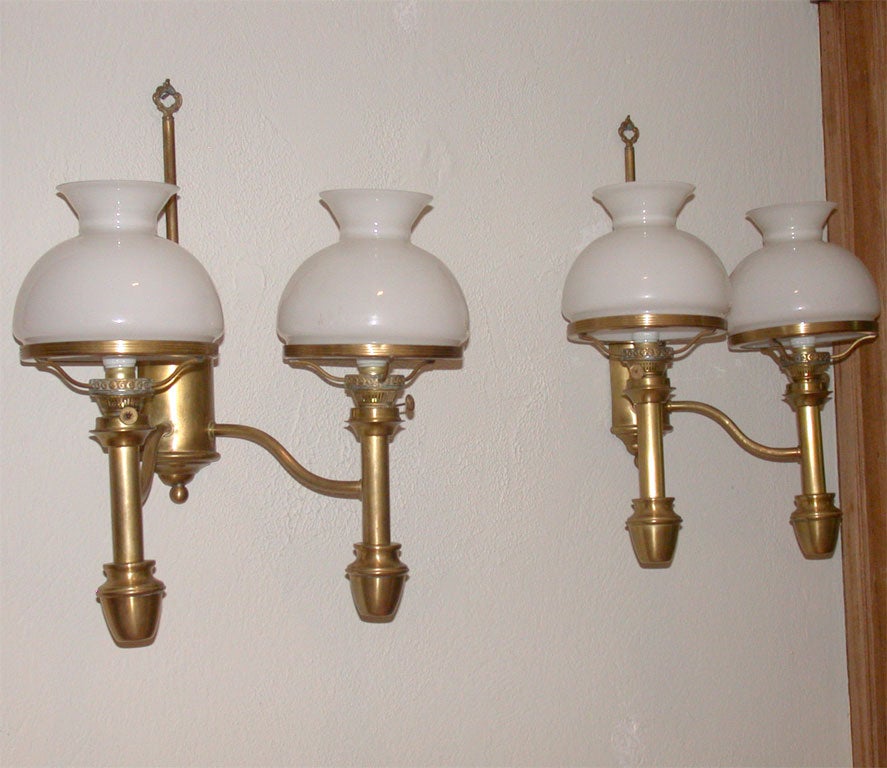 Pair of brass sconces in a double carriage lamp shape with opaque shades - #30-20831