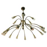 Italian 18 arm chandelier with patinated brass, painted metal.