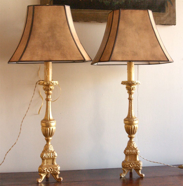 Pair of gilt candlestick lamps