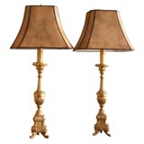 Pair of gilt candlestick lamps
